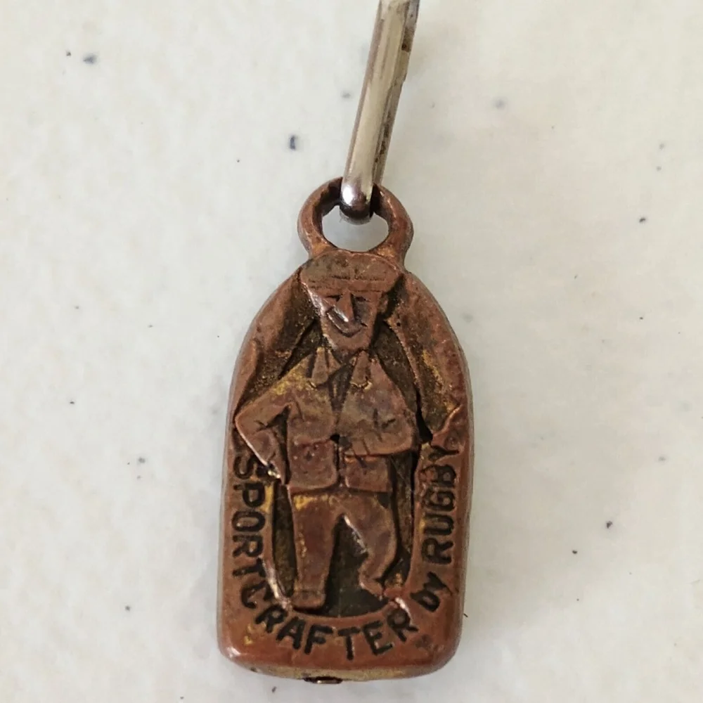 Vintage Sportscrafter By Rugby Metal Pendant Charm Brass Tone